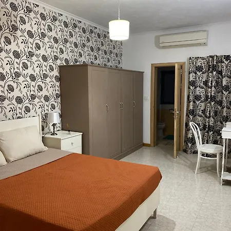 Adinkra Suits Balzan