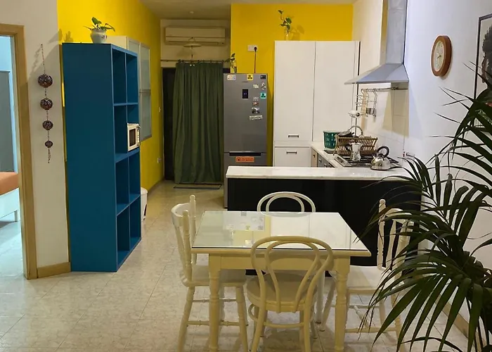 アパート Adinkra Suits