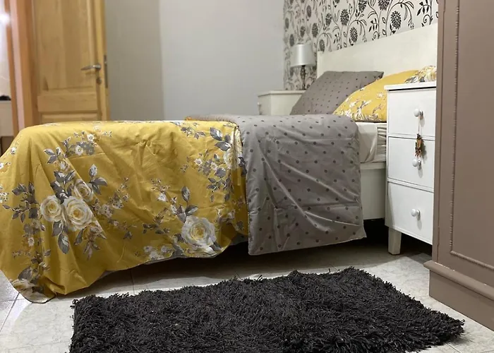 アパート Adinkra Suits